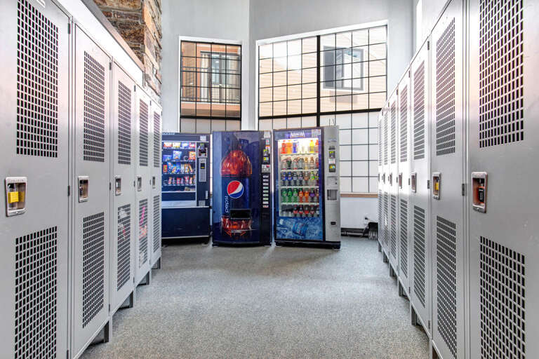 Vending machines and secure storage are conveniently located in this bright, modern space with soaring windows and exposed brick accents. Your snacks and belongings stay safe and easily accessible throughout your stay.