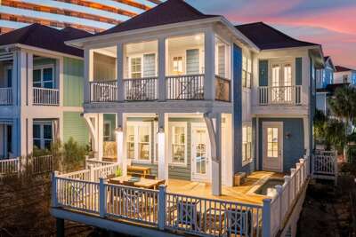 Welcome to Anchors Aweigh! A lakefront paradise gated in a beachside community! Just Steps away to the BEACH!