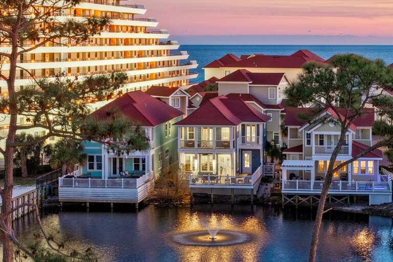 Welcome to Anchors Aweigh! A lakefront paradise gated in a beachside community! Just Steps away to the BEACH!