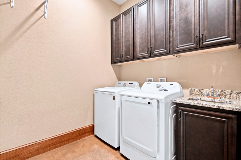 1st Floor - Laundry Room w/ your washing machine & essentials