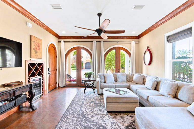 1st Floor - 🛋️ Open Living Area: Sectional couch, wine fridge, and a welcoming vibe