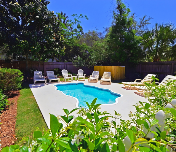 Crystal Beach Bungalow - home w/  Lush landscaping & enormous Gated backyard w/ private POOL & Tiki Bar!