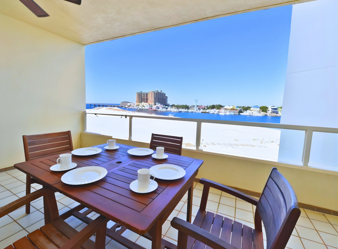 Covered Balcony with dining table and sweeping views!