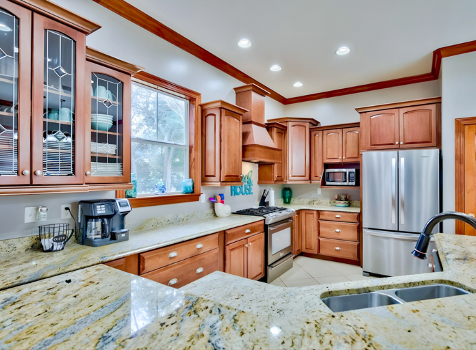 1st Floor - 🍽️ Gourmet kitchen with bar seating and stainless steel appliances