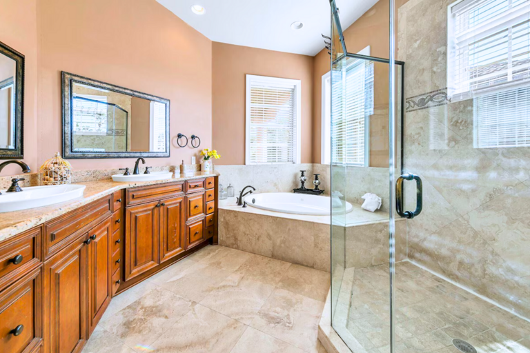 3rd Floor - Spa-like en suite bath with a sunken tub, walk-in shower & dual vanities