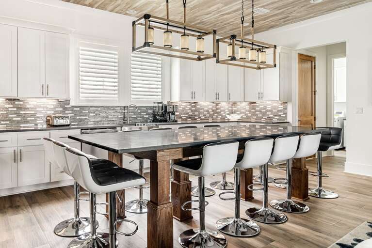 Interior Kitchen With Island And Bar Stools