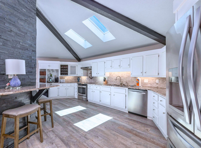 2nd Floor - Open-Concept Living Area: Spacious kitchen, dining area, and comfortable seating for gatherings.