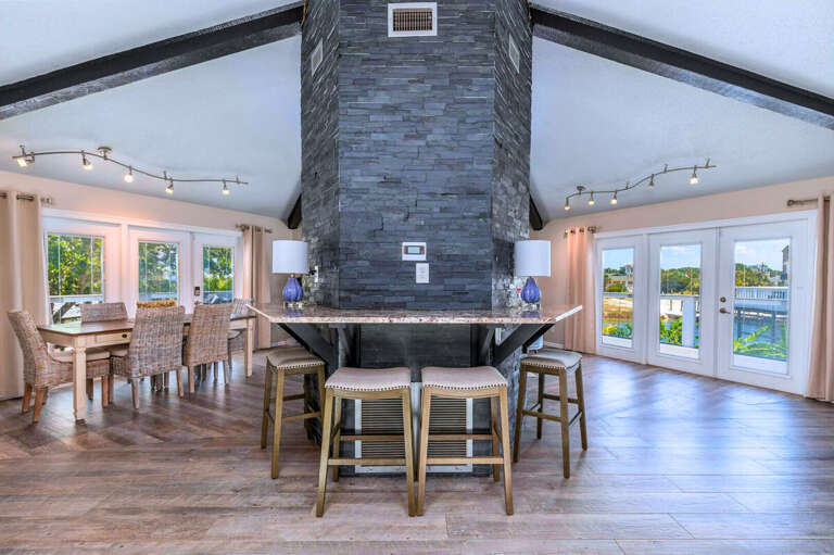 Open-Concept Living Area: Spacious kitchen, dining area, and comfortable seating for gatherings. Open-Concept Living Area: Spacious kitchen, dining area, and comfortable seating for gatherings.