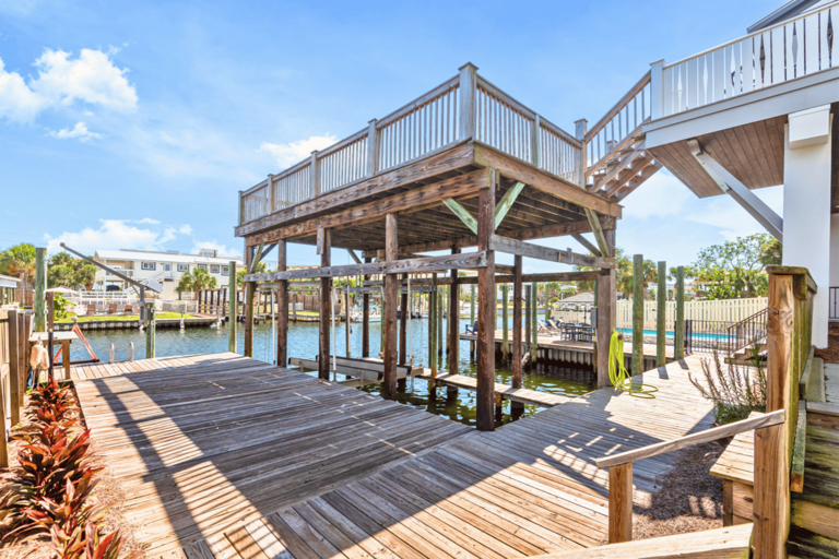 ✔ Private Dock – Includes a boat slip, jet ski davit, and fish cleaning station—perfect for water lovers!