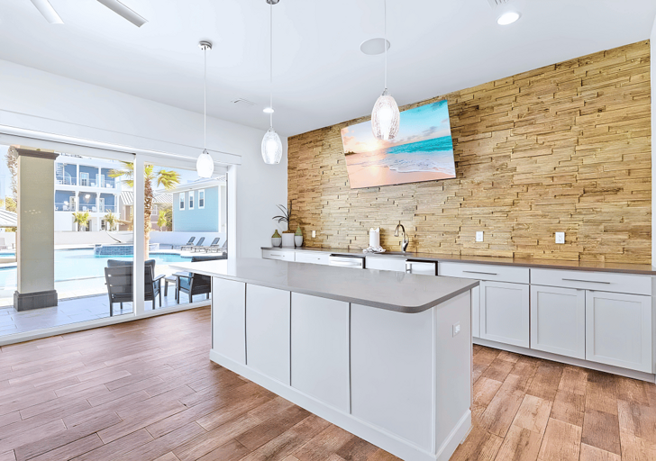 The 1st floor kitchenette includes an ice maker, sink, and an extra dishwasher.