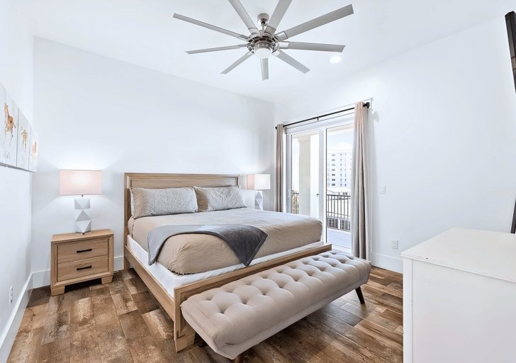 3rd floor rustic Bedroom #5 with a king bed has access to the front balcony.