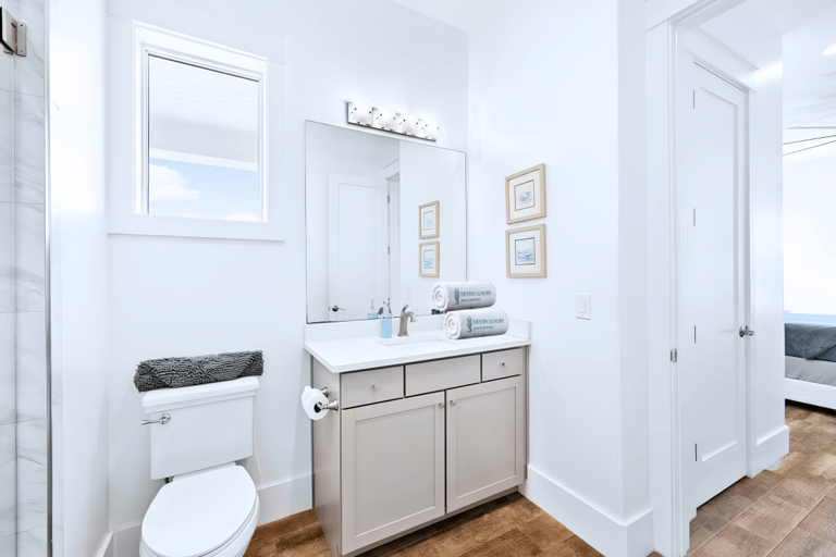 Bathroom #8 has a walk-in shower for Bedrooms #8 & 9, also accessed from the hall.