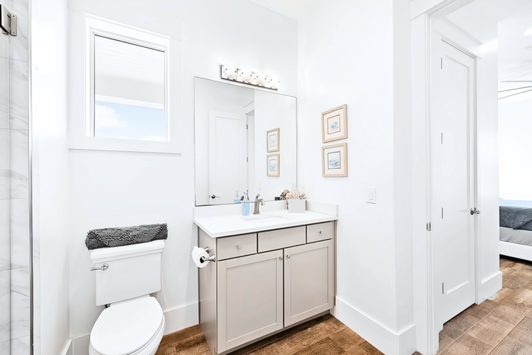 Bathroom #8 has a walk-in shower for Bedrooms #8 & 9, also accessed from the hall.