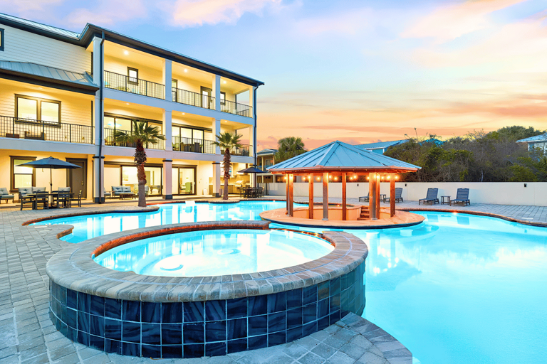A stunning spa view with a string-lit pavilion and swim-up bar!