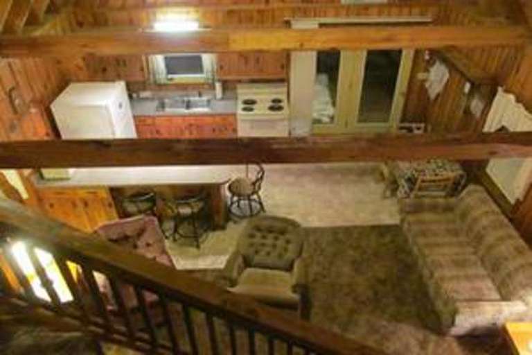 Wooden Cabin Interior With Loft And Kitchen Wooden Cabin Interior With Loft And Kitchen