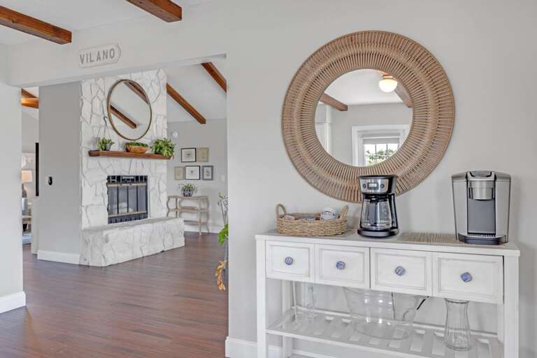 Interior Of A Vacation Rental Living Room With Fireplace And Coffee Station