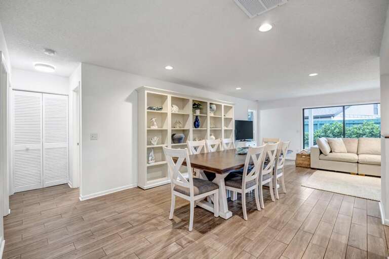 Bright Built-ins Border Bespoke Dining Setup, Soft Sofa Seating Shows Serene Scene