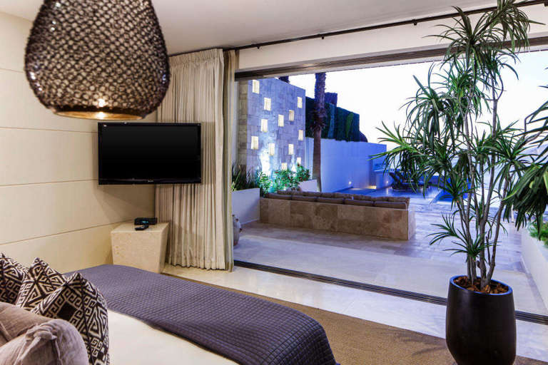 Villa Serena Cabo Master bedroom view to fire feature