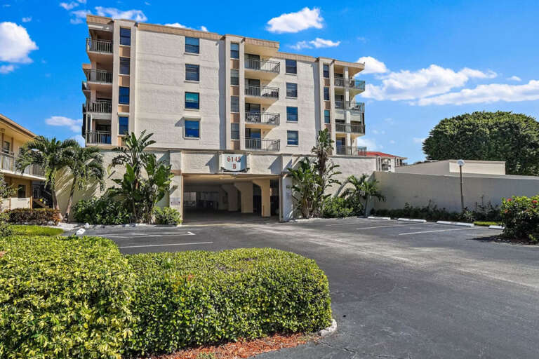 Front of Building and Covered Parking Front of Building and Covered Parking