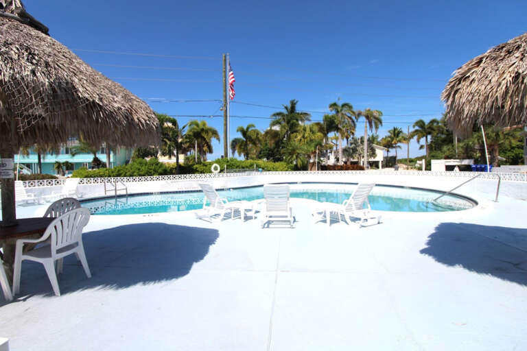 Pool Area with Lounge Chairs Pool Area with Lounge Chairs
