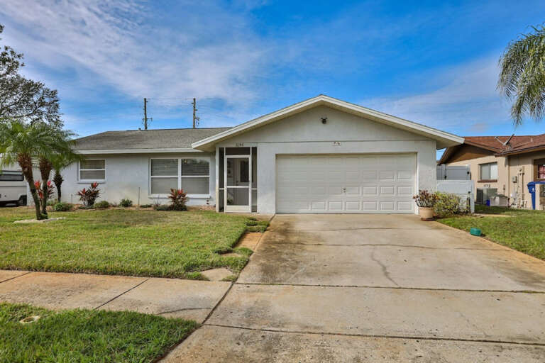 Front of House with Driveway
