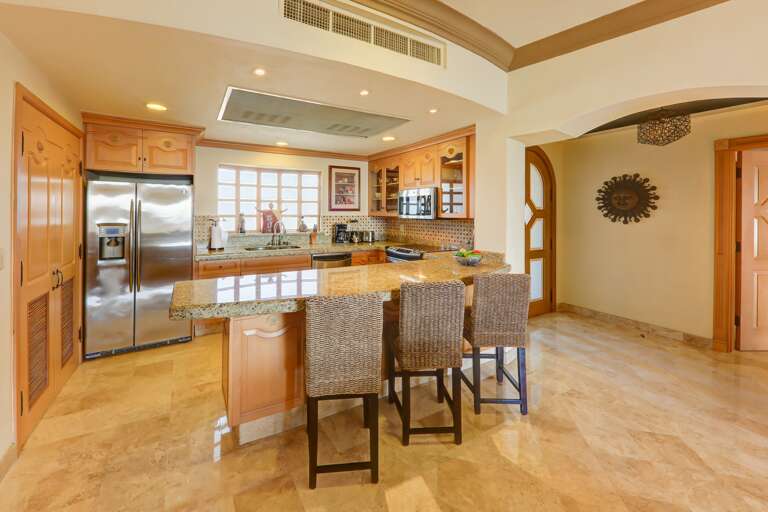 Kitchen and open foyer Kitchen and open foyer