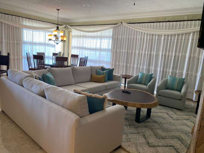 Newly renovated Living Room, all new furniture, rug, custom pillows and TV