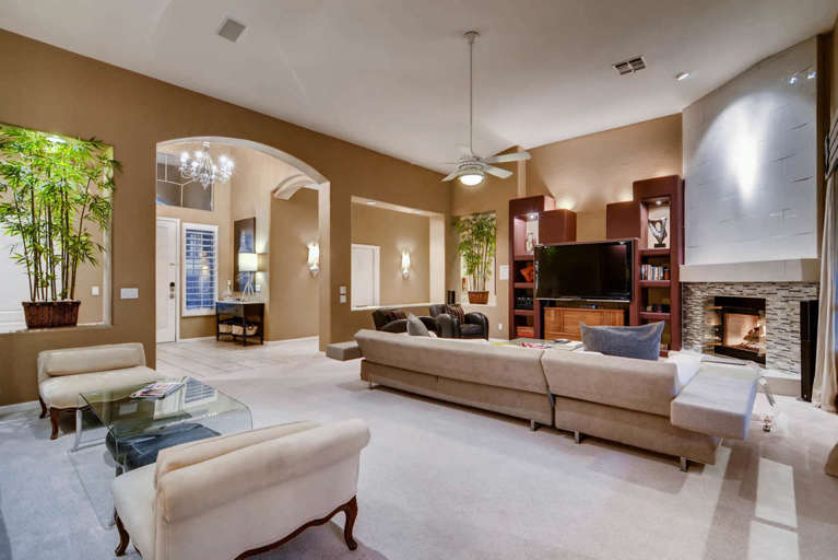 Elegant Living Room Interior With Sectional Sofa And Fireplace Elegant Living Room Interior With Sectional Sofa And Fireplace