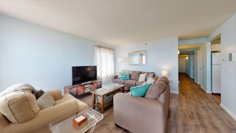 Living area with ample seating | Smart TV Living area with ample seating | Smart TV