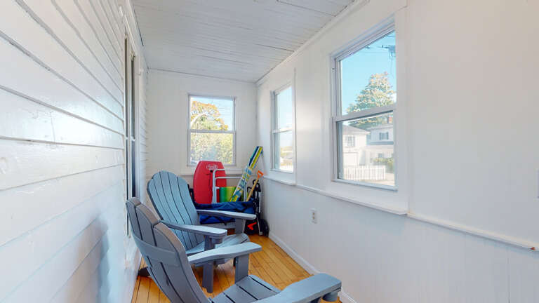 3 Season Porch| Entrance to unit A |Beach Cart and Gear available  3 Season Porch| Entrance to unit A |Beach Cart and Gear available