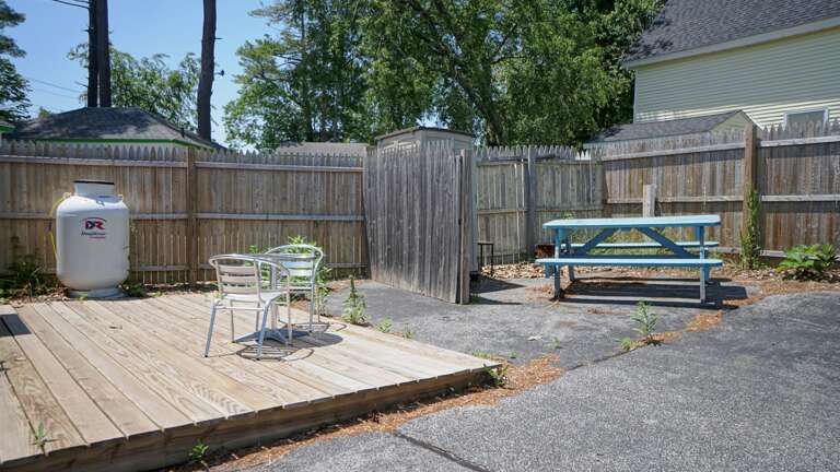 Exterior back deck with seating
