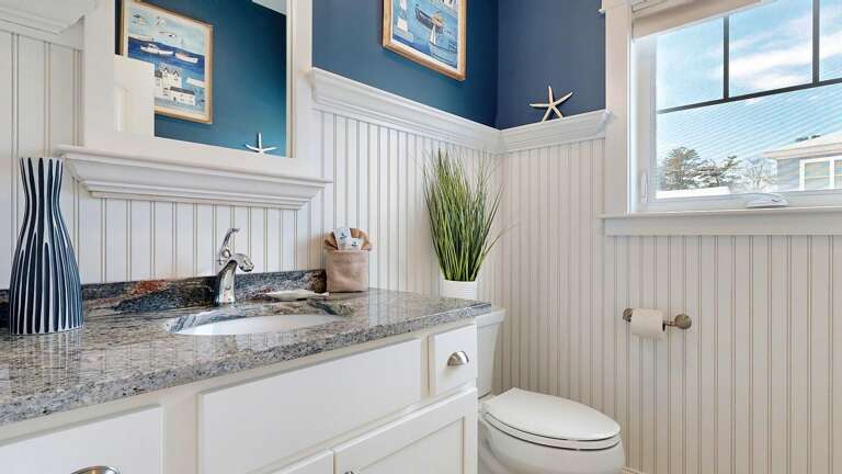 Second Floor half bath located off the kitchen next to the stairs  Second Floor half bath located off the kitchen next to the stairs