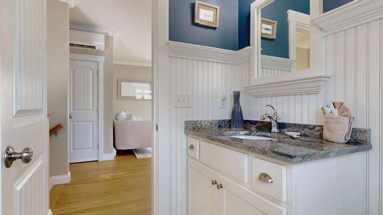 Second Floor half bath located off the kitchen next to the stairs  Second Floor half bath located off the kitchen next to the stairs