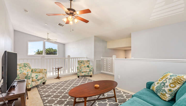 The  loft features an office desk for working away from home