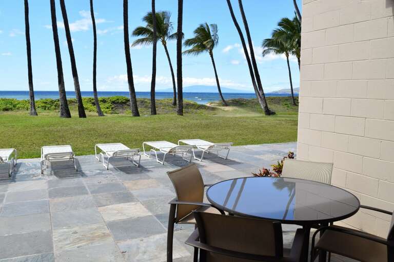 Enjoy coffee and meals on your private lanai with seating for 4