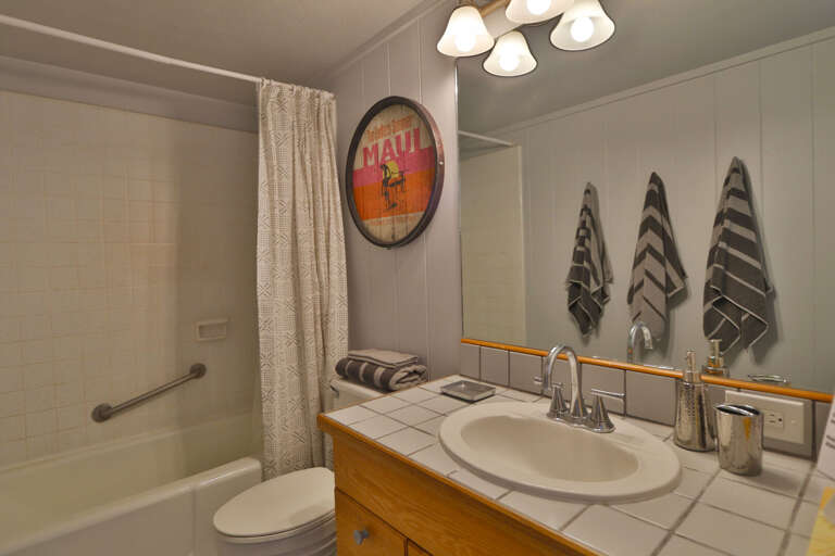 Bathroom with full combination tub and shower