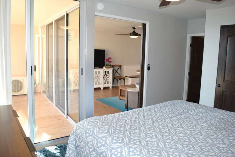 Slider door separated bedroom and living area