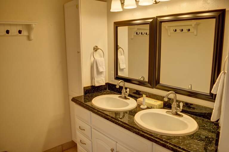 Upstairs bathroom with dual sinks Upstairs bathroom with dual sinks