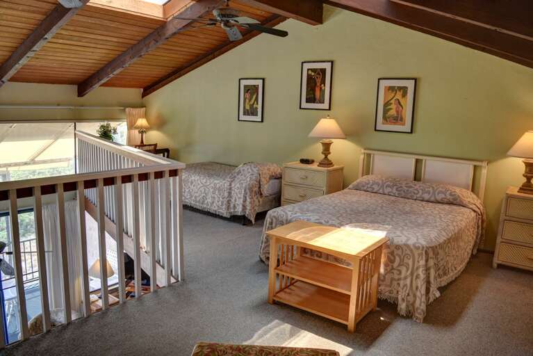 Queen bed and Twin bed in this loft