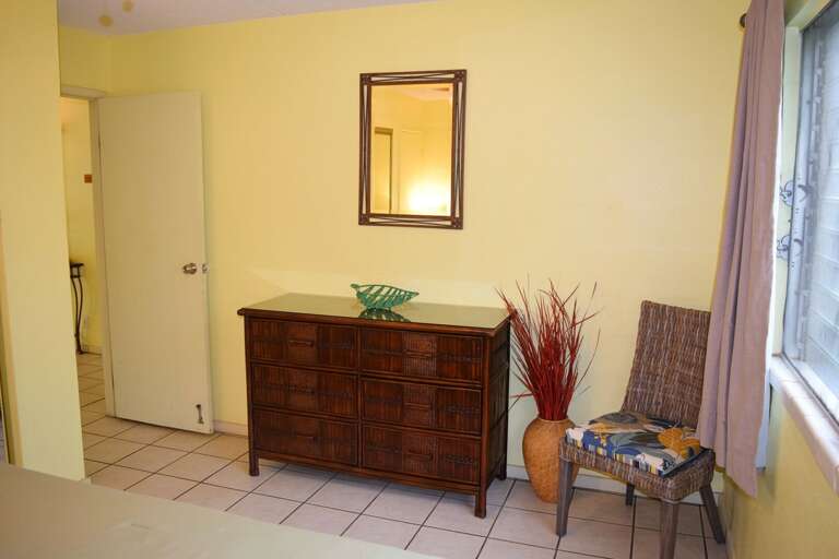Bedroom with dresser storage Bedroom with dresser storage