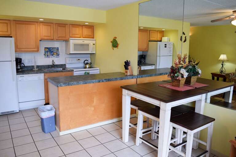 Dining area with seating for 4 Dining area with seating for 4