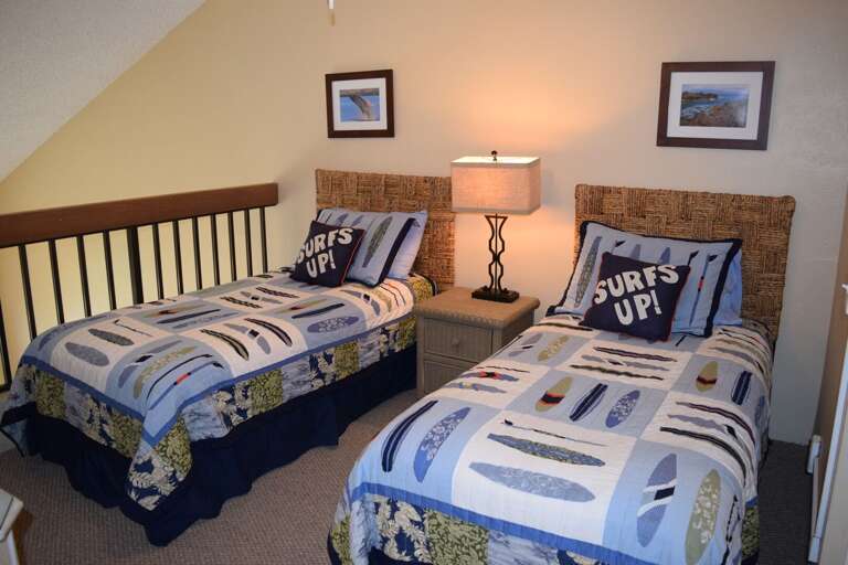 Upstairs guest bedroom loft with two twin mattresses
