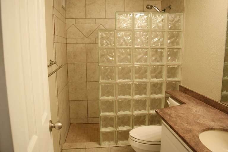 Bathroom with tiled walk-in shower