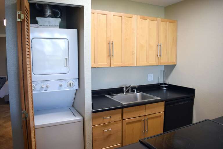 Full kitchen with convenient in-unit washer/dryer