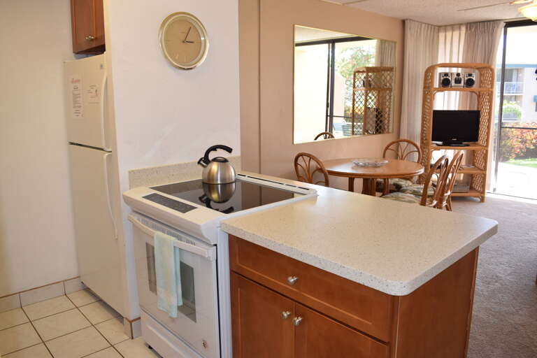 Kitchen opens to living area