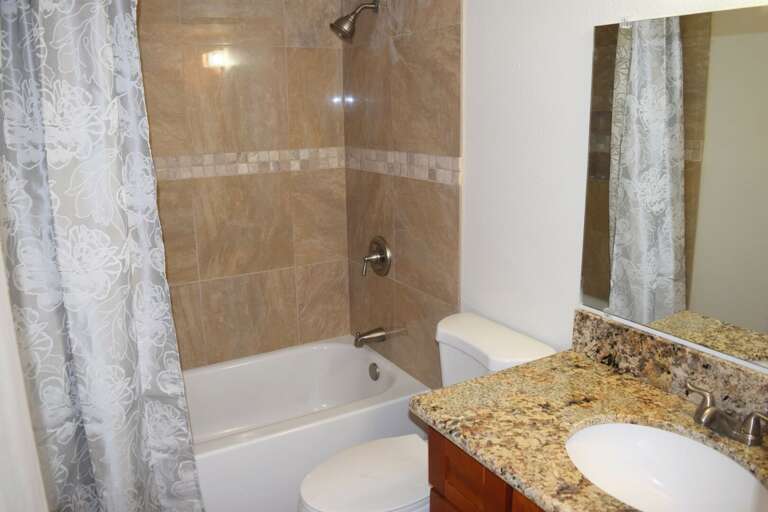 Guest bathroom with shower/tub combination Guest bathroom with shower/tub combination