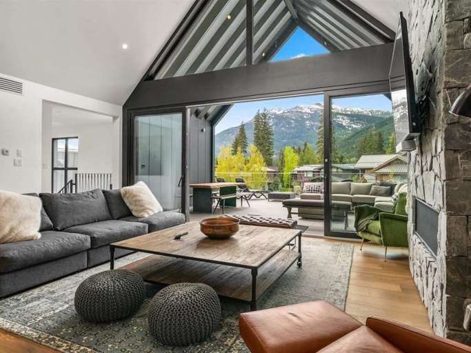 Living Room with Vaulted Ceilings and Mountain Views