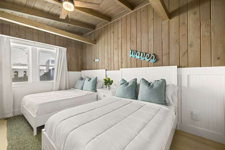 Bedroom with two full beds