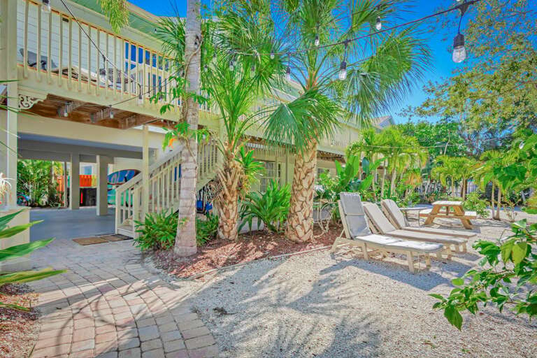 Chaise loungers and café lights | Siesta Key 1BR