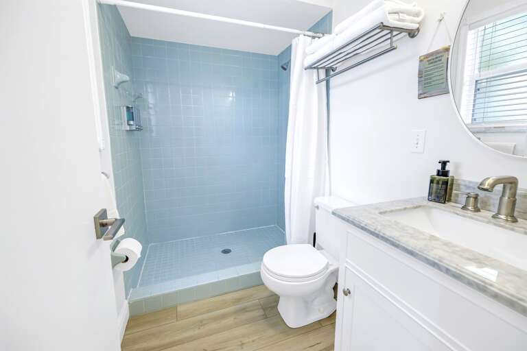 Full bathroom with step in shower, Siesta Key 1BR